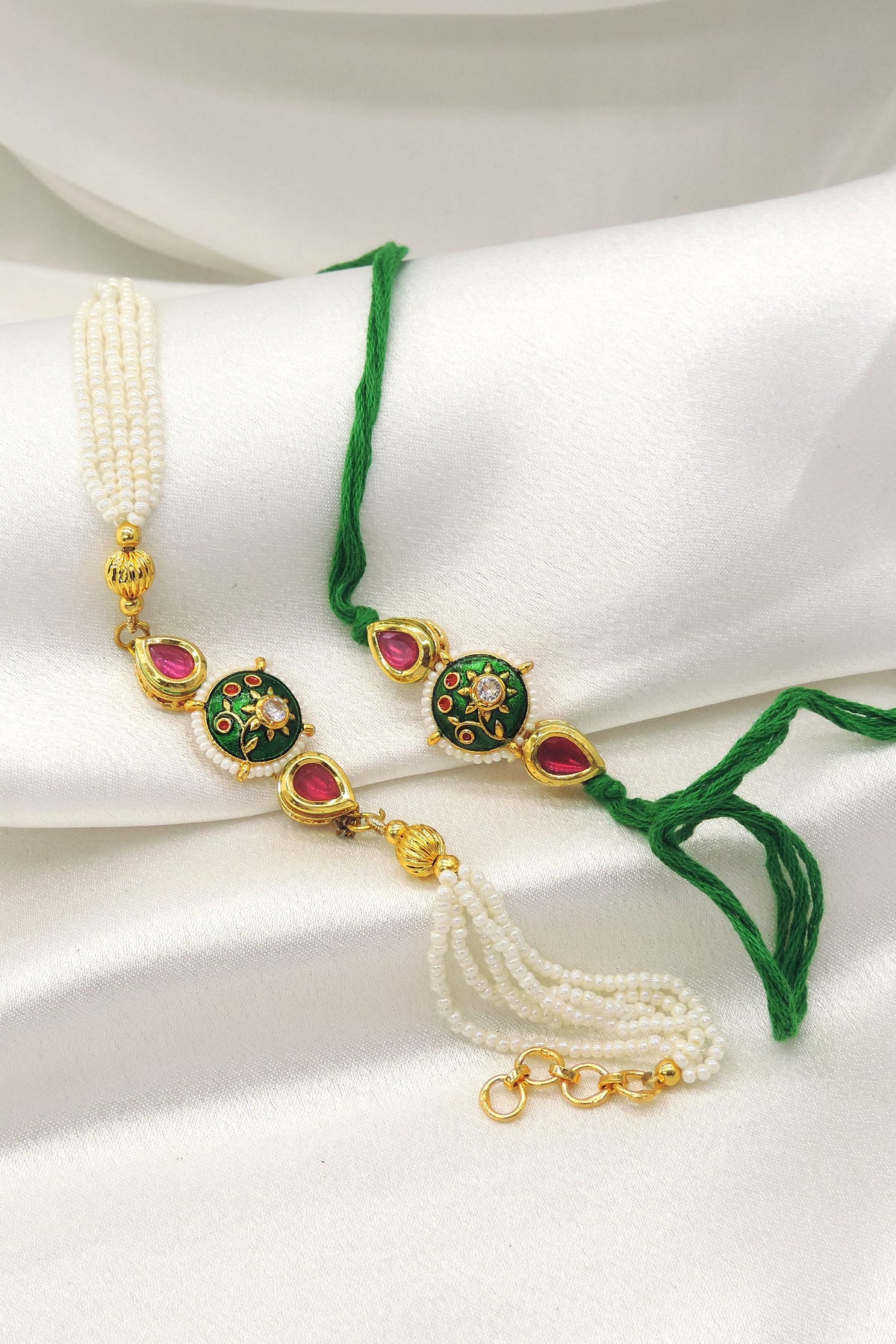 Green meenakari kundan pearl bhaiya bhabhi rakhi set by Joyrias