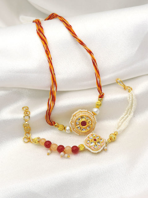 Circular kundan pearl bhaiya bhabhi rakhi set by Joyrias