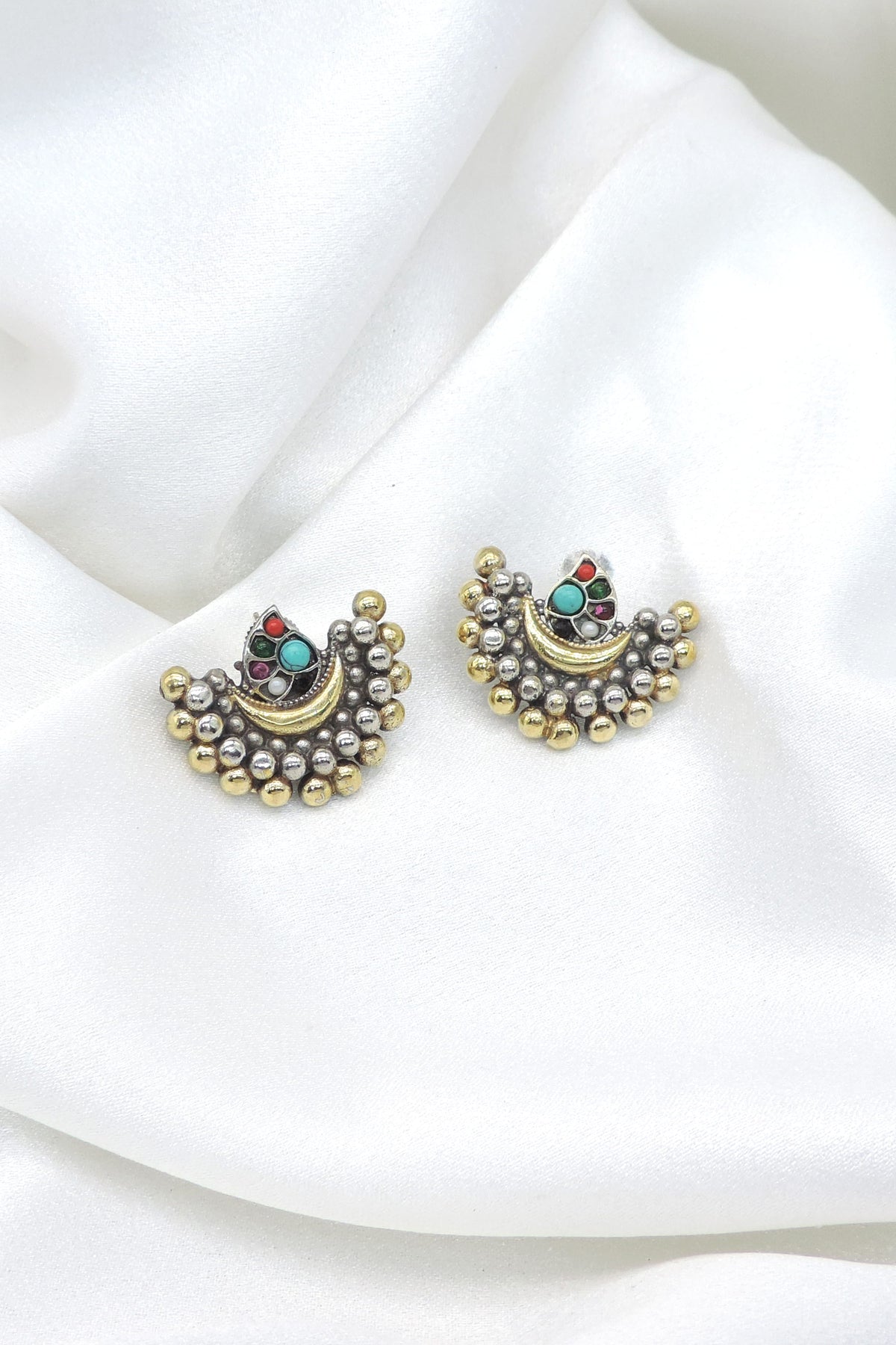Oxidized dual-tone multicolor crescent stud earrings with silver and gold-toned detailing by joyrias
