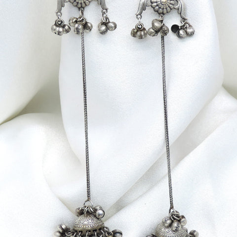 Oxidized silver floral long chain jhumka earrings with ruby-toned detailing by joyrias