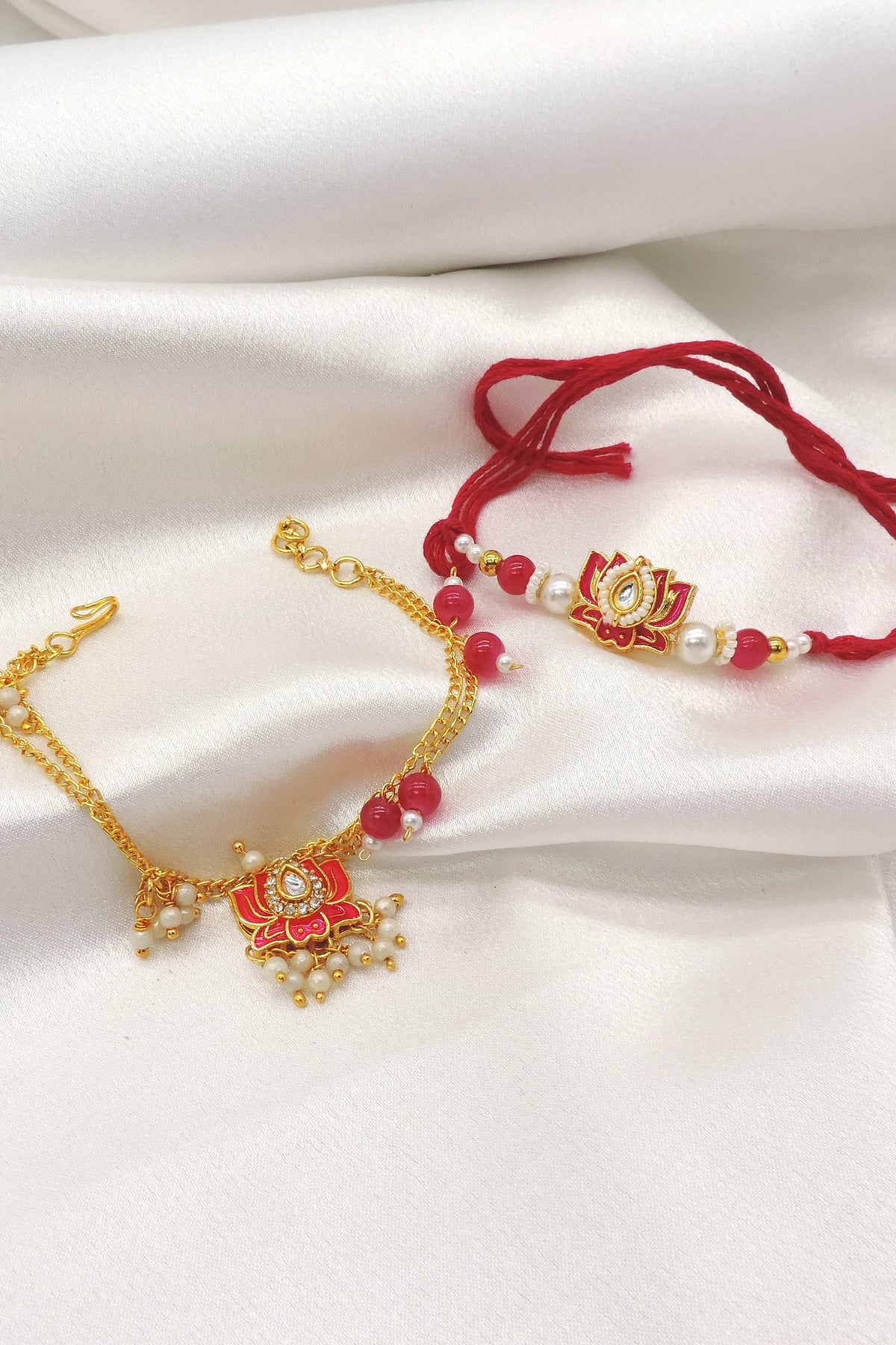 Lotus enamel kundan pearl bhaiya bhabhi rakhi set by Joyrias