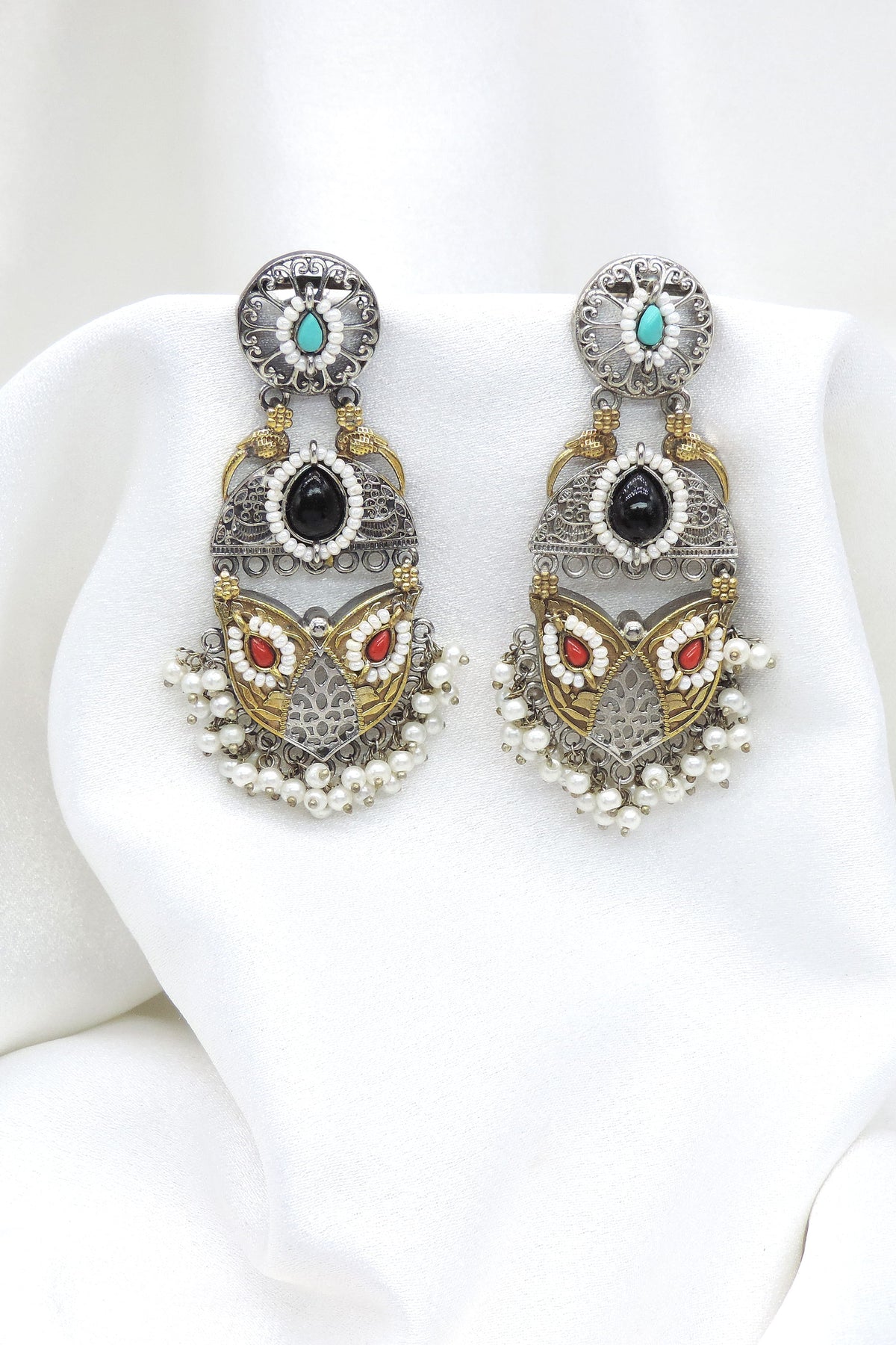 Oxidized dual-tone multicolor floral drop earrings with turquoise black red and pearl detailing by joyrias