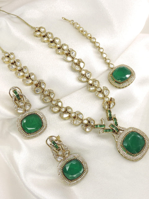 Emerald Kundan AD Necklace Set with Matching Earrings & Maang Tikka by Joyrias