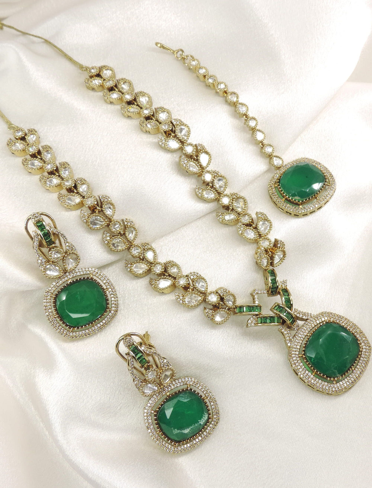 Emerald Kundan AD Necklace Set with Matching Earrings & Maang Tikka by Joyrias