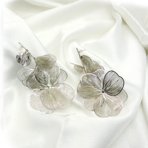 Silver floral drop earrings with layered petal design