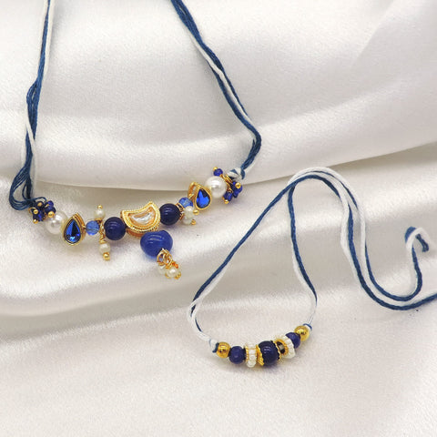 Blue stone kundan pearl bhaiya bhabhi rakhi set by Joyrias