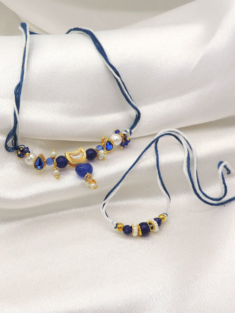 Blue stone kundan pearl bhaiya bhabhi rakhi set by Joyrias
