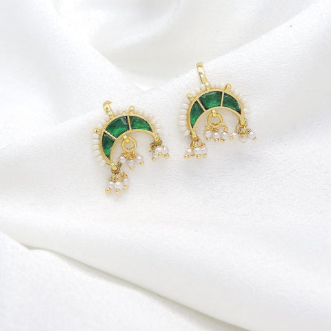Gold-toned green stone chandbali drop earrings with white bead and pearl detailing by joyrias