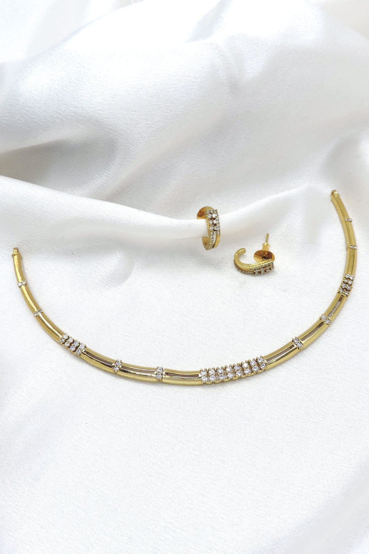 Golden linear CZ necklace set with matching earrings by joyrias