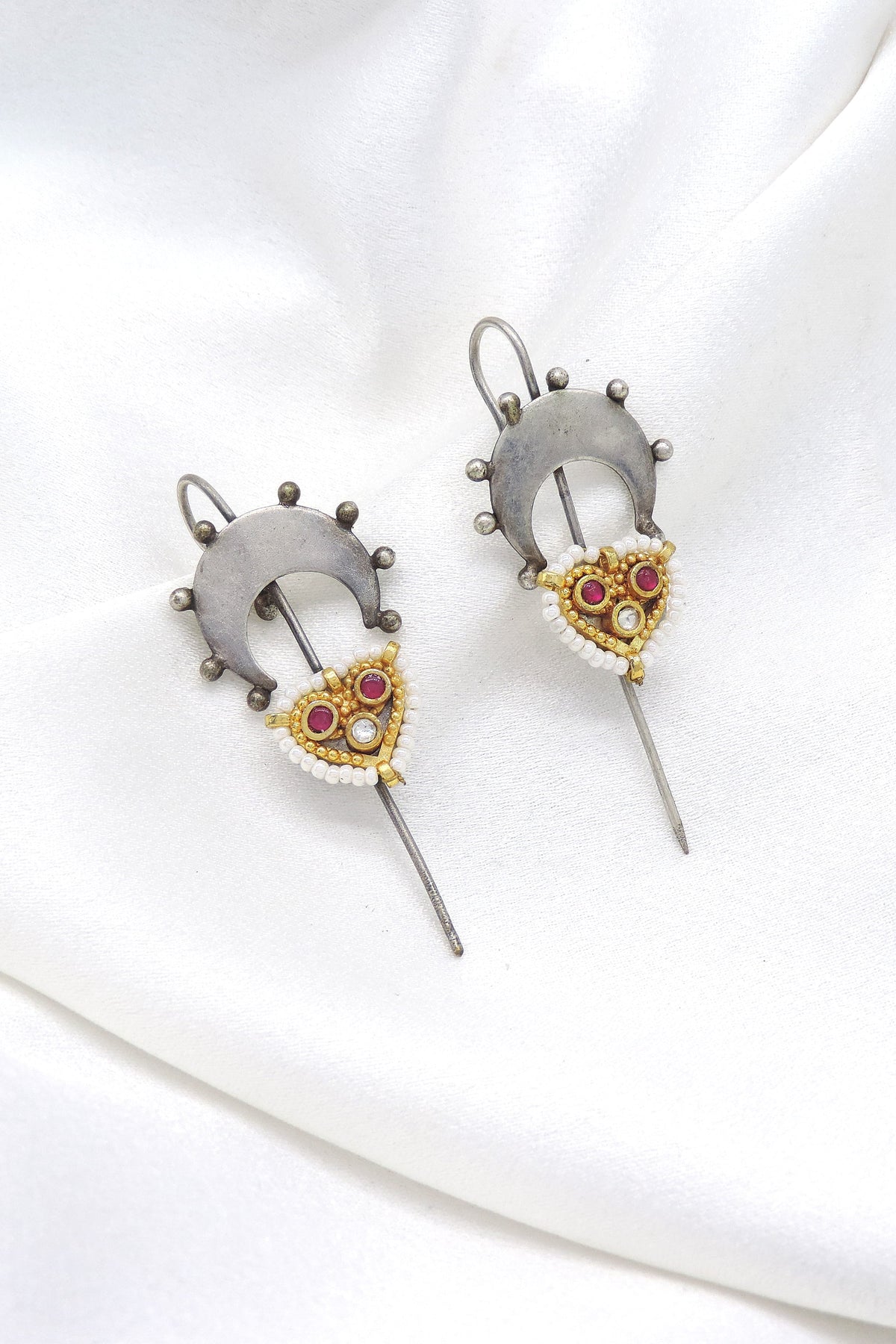 Oxidized silver ruby pearl ear cuff earrings with traditional detailing by joyrias