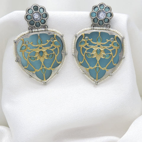 Oxidized silver blue enamel floral drop earrings with gold-toned detailing and pearl border by joyrias
