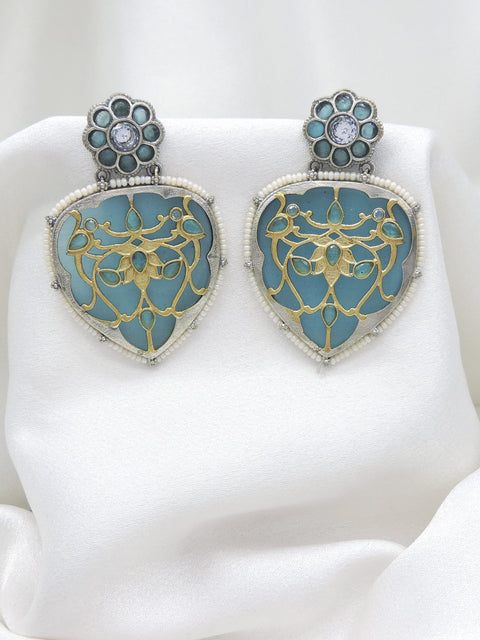 Oxidized silver blue enamel floral drop earrings with gold-toned detailing and pearl border by joyrias