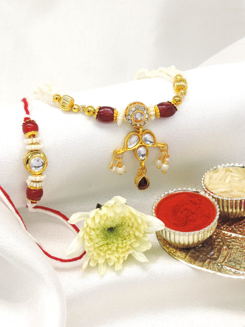 Kundan drop bhaiya bhabhi rakhi set with CZ halo and pearl accents by Joyrias