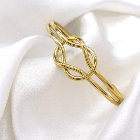 Gold Knot Cuff Bracelet by Joyrias