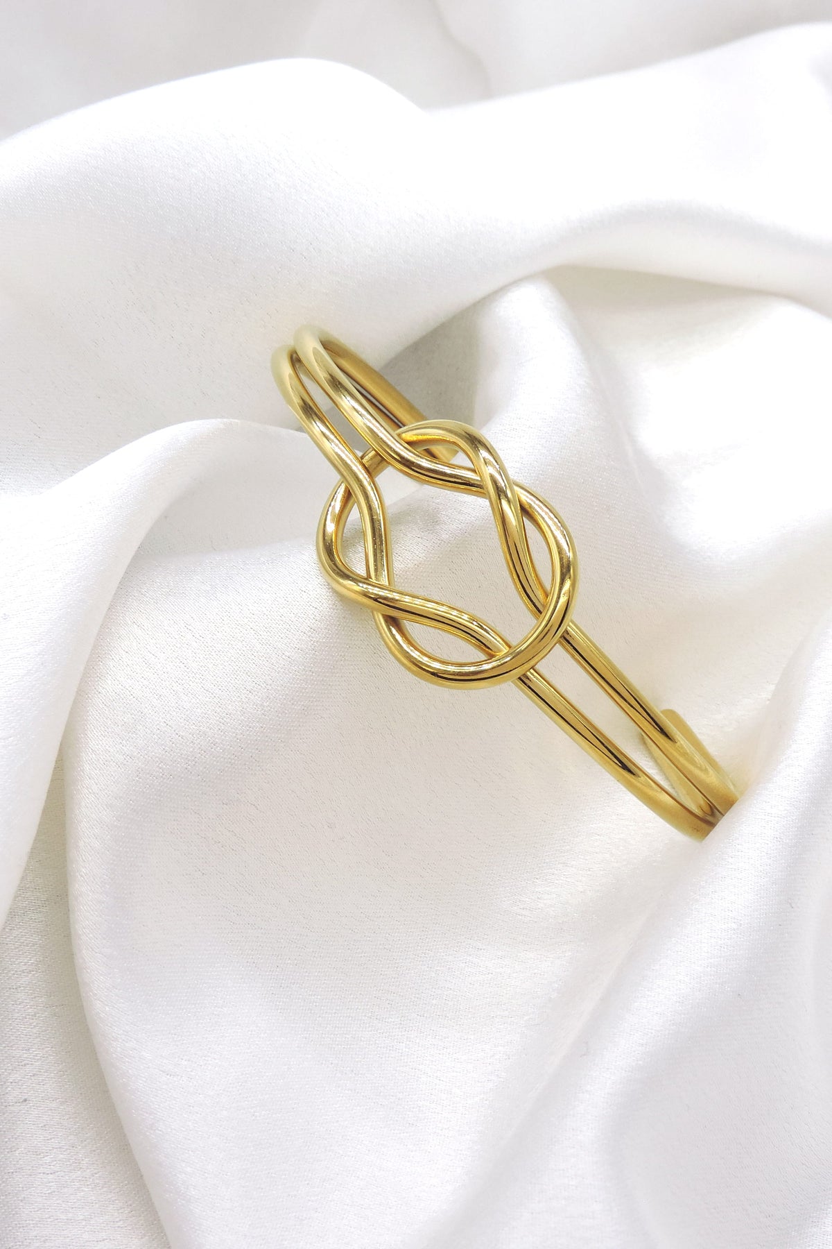 Gold Knot Cuff Bracelet by Joyrias