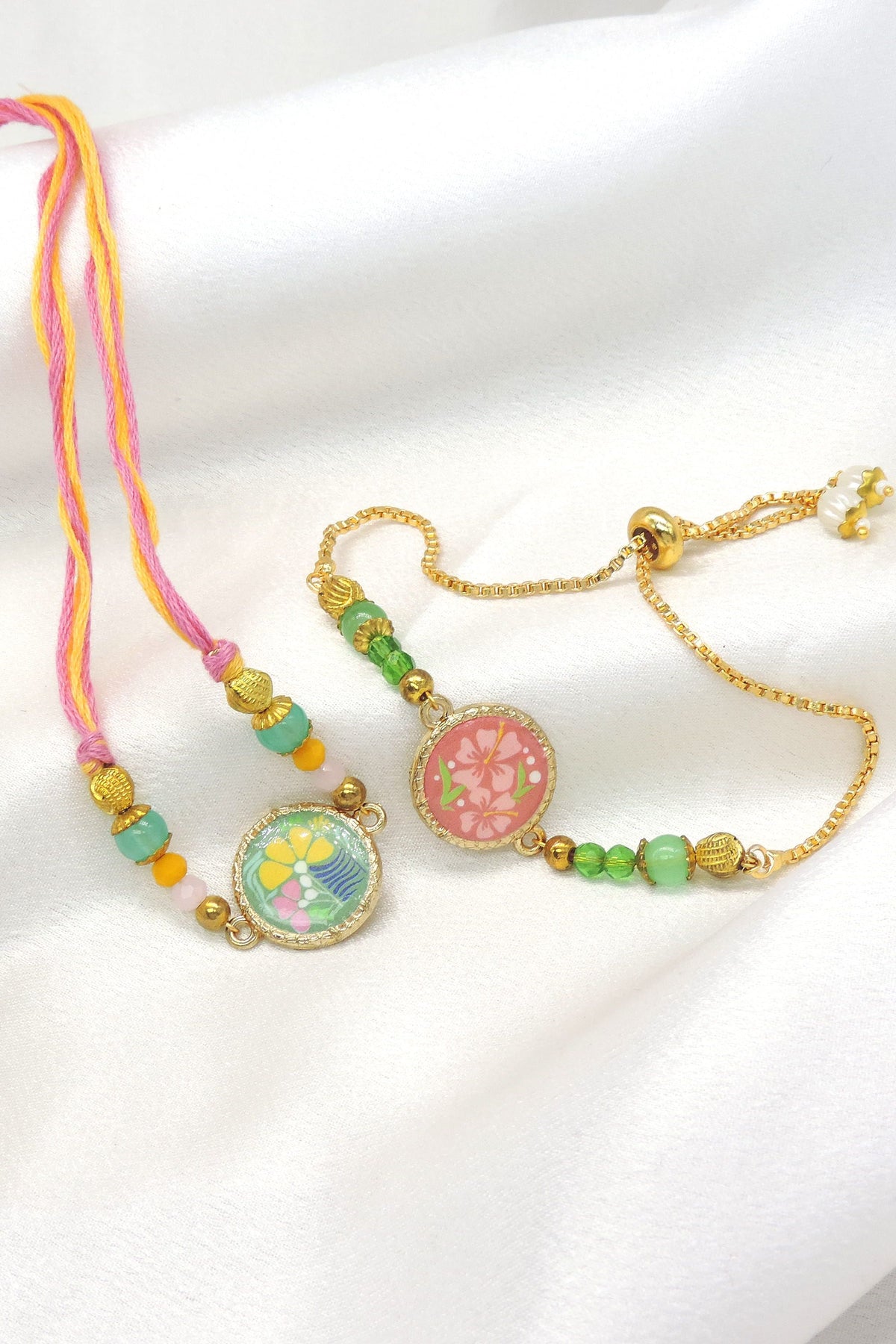 Enamel floral disc bhaiya bhabhi rakhi set with colorful beads by Joyrias