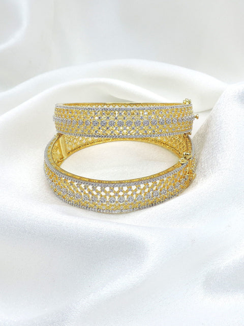 Opulent gold-toned AD wide bangle set with intricate sparkling stone detailing by joyrias