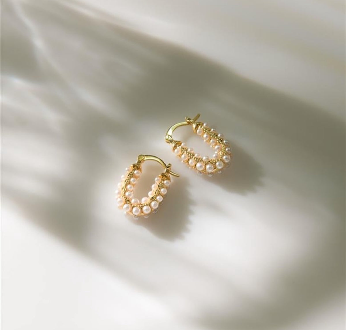 Heart shaped pearl hoop earrings worn – Indian pearl earrings for festive occasions – Joyrias