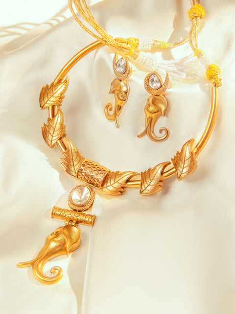 Gold finish elephant motif pendant necklace with matching stud earrings