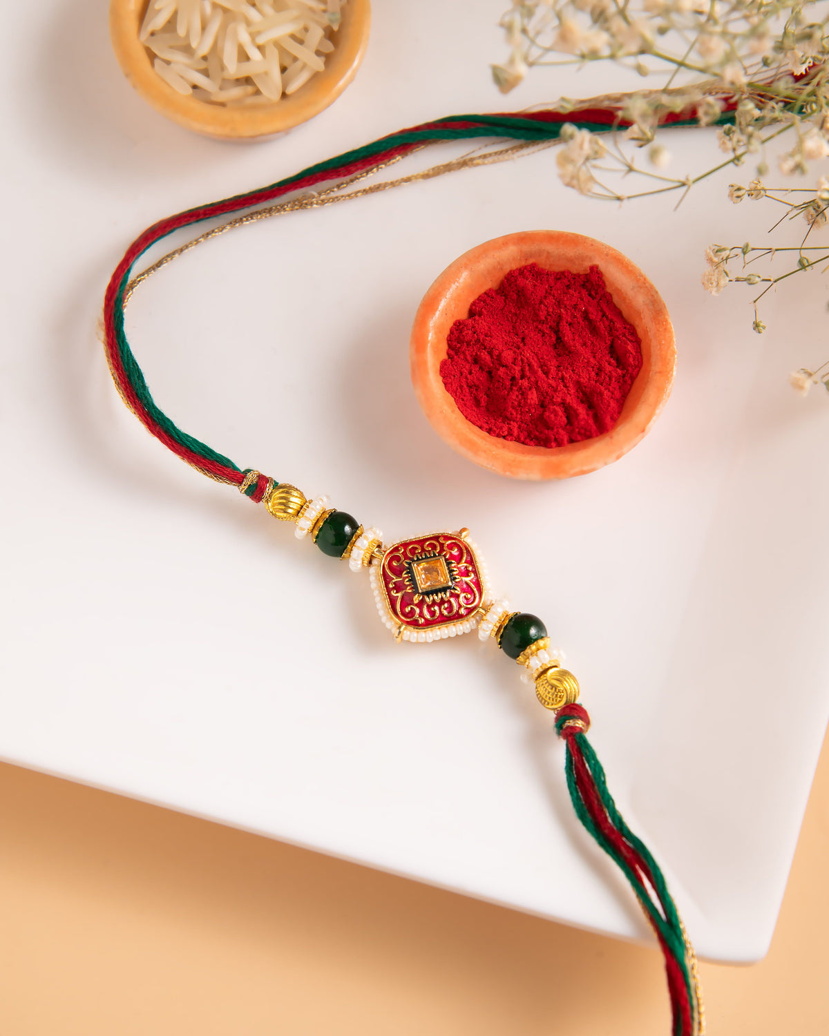Ruby Meena Bhaiya Rakhi with Red Enamel Joyrias