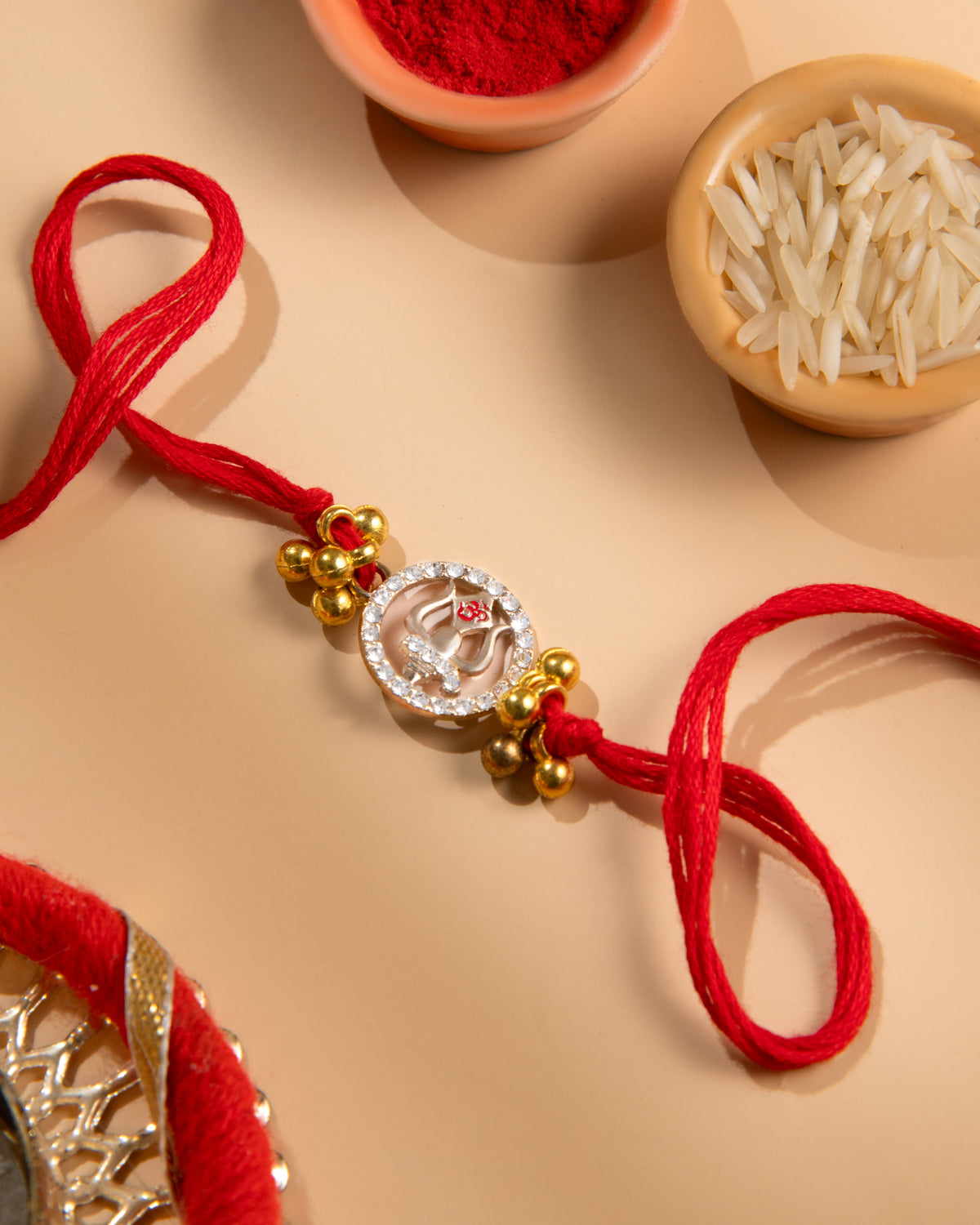 Mahadev Trishul Rakhi for Brother | Shiv Ji Trident CZ Stone Rakhi