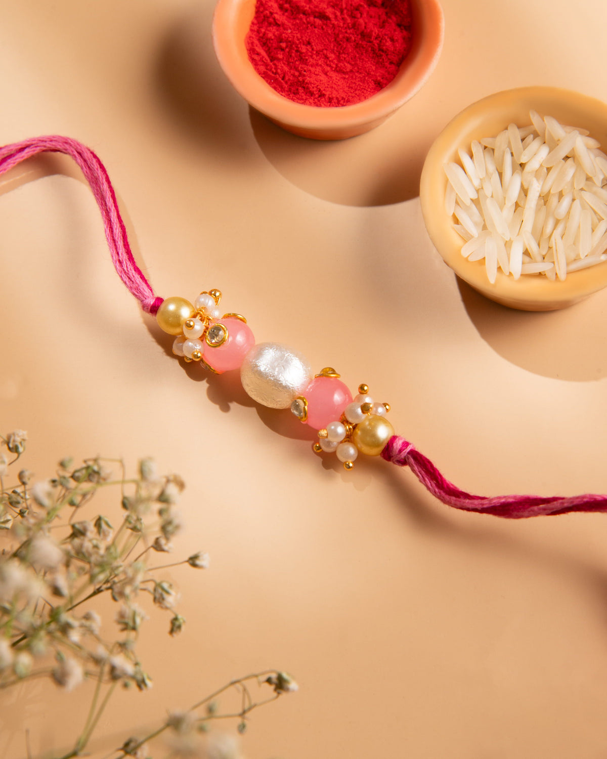 Pink Pearl Bhaiya Rakhi by Joyrias