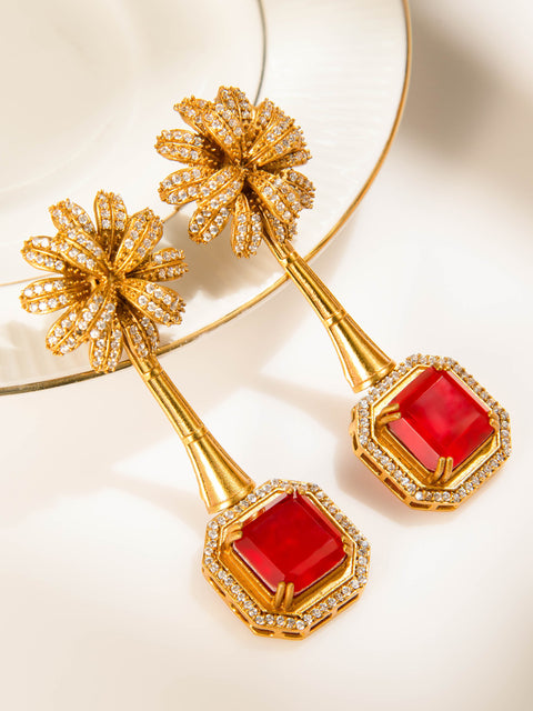 Gold-tone floral drop earrings with ruby-red square stone and crystal accents