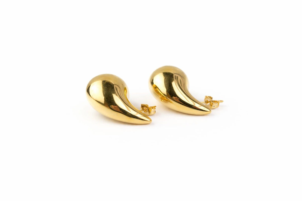 Minimalist gold teardrop stud earrings with polished finish