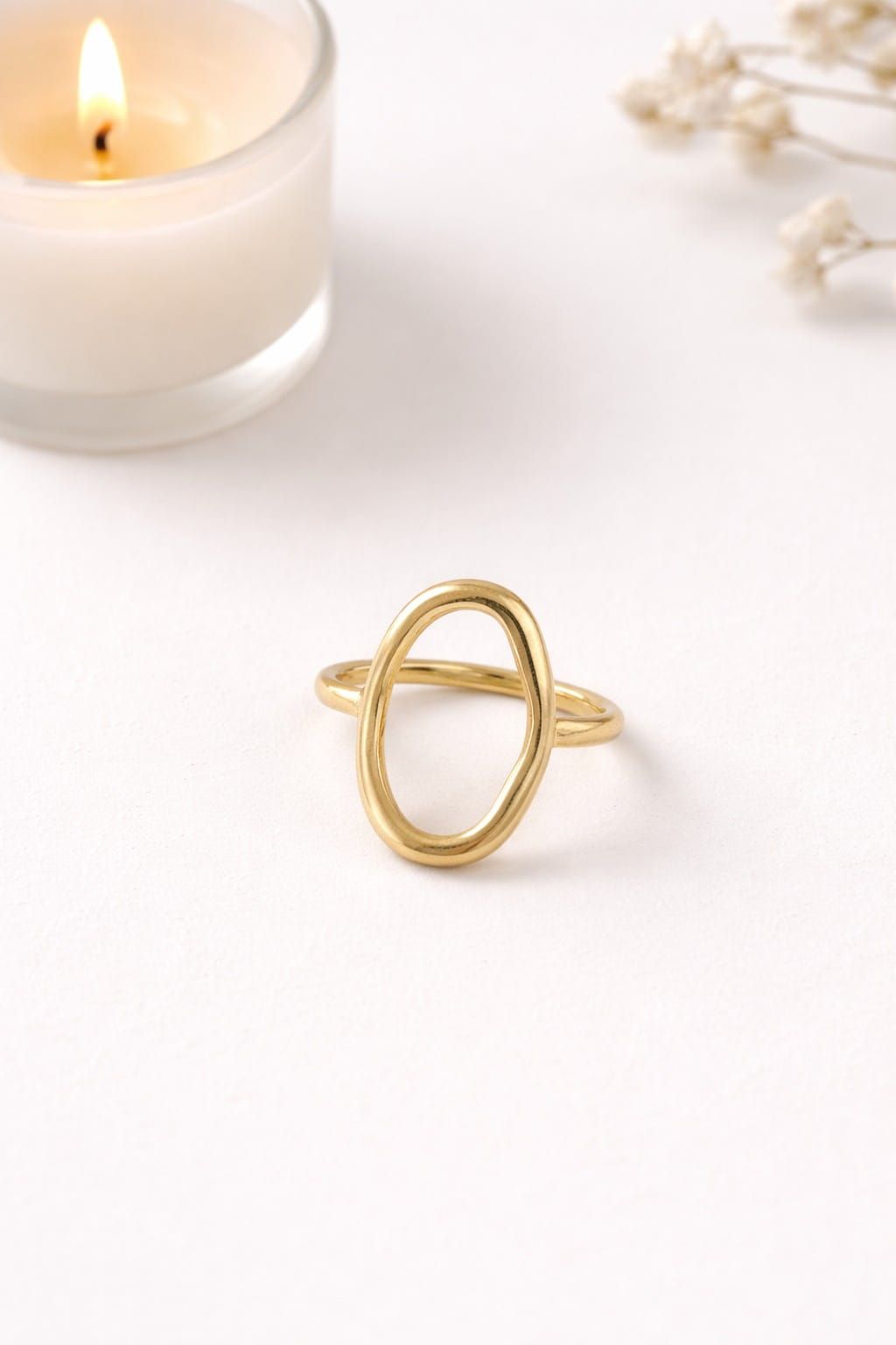 Minimalist gold open oval statement ring