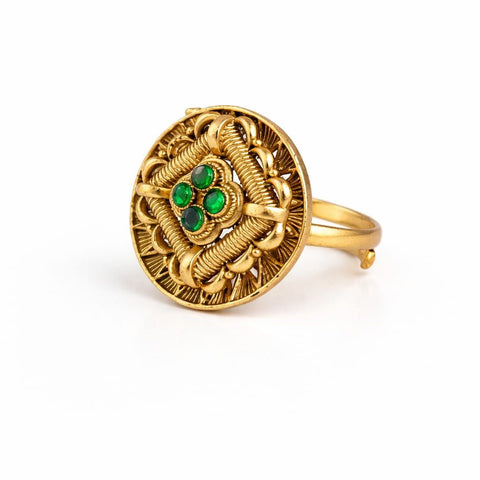 Vintage emerald green statement ring with intricate gold circular design