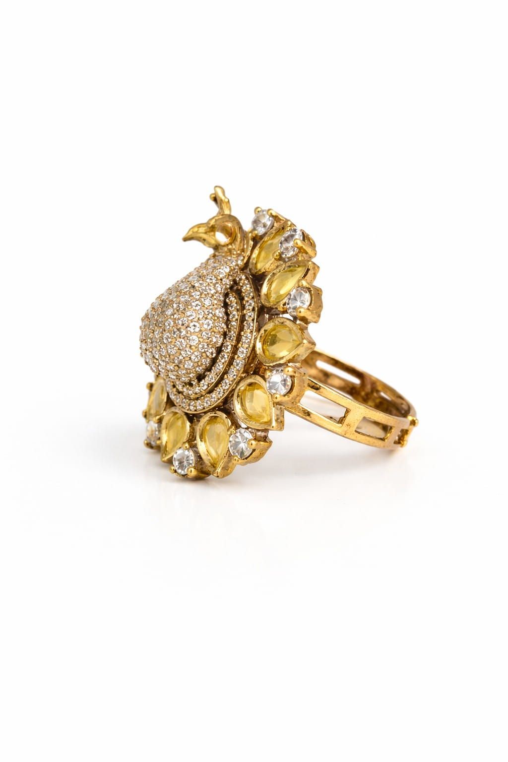 Gold peacock statement ring with yellow stones and crystal detailing